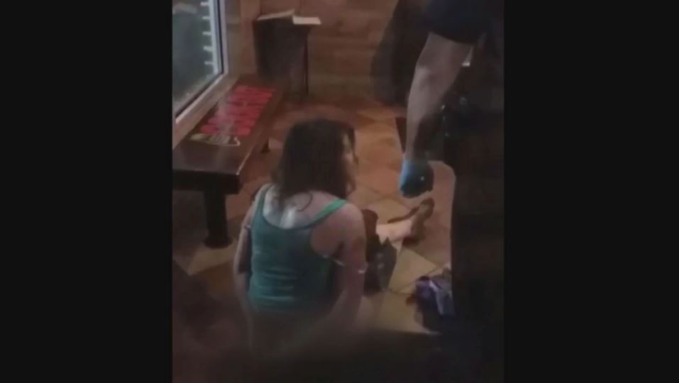 Naked woman falls through a fast food restaurant’s ceiling