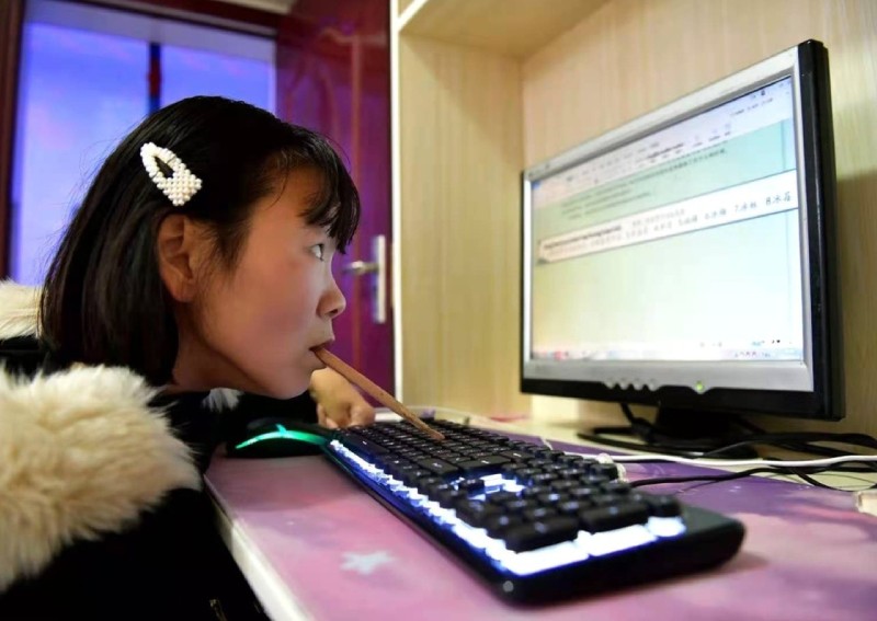 Woman without hands and feet wrote 12 novels totaling more than 2 million words