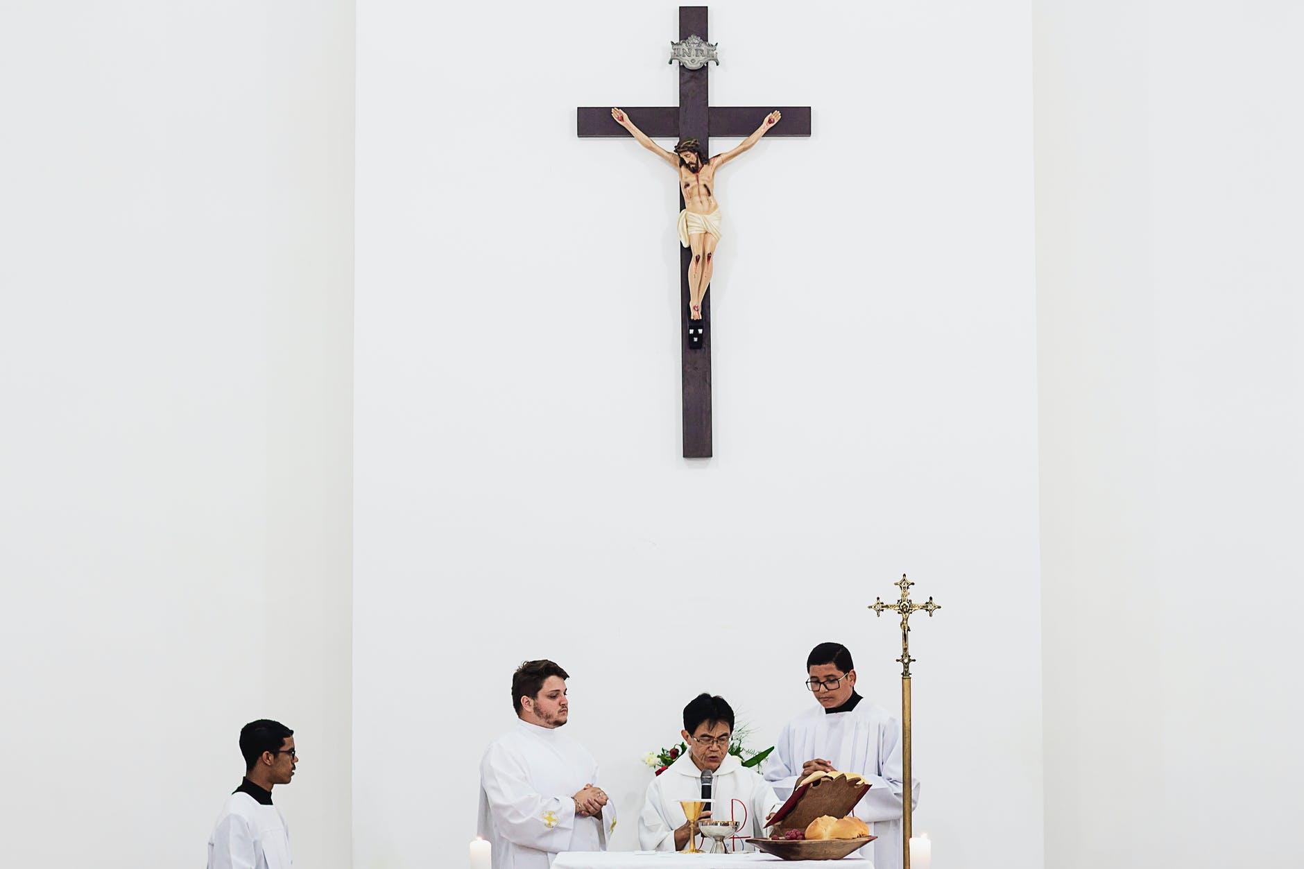 priest using microphone