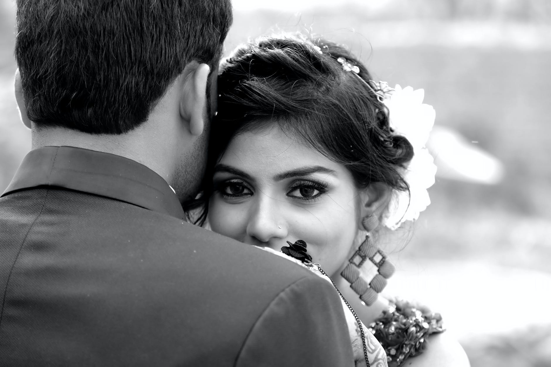 greyscale photo of man and woman
