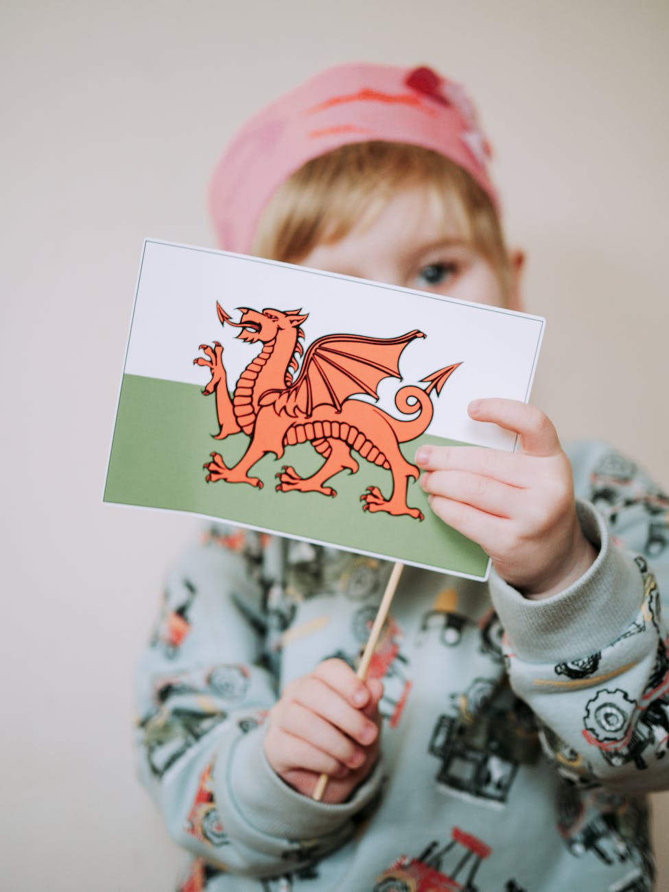child holding welsh flag