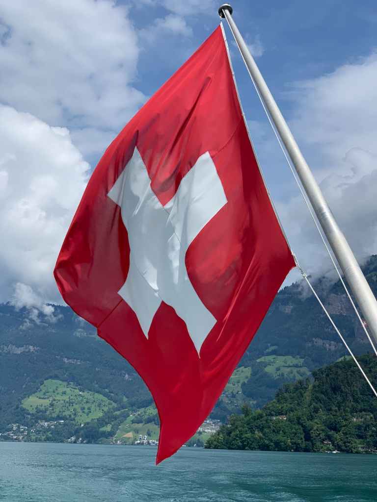 flag of switzerland on a watercraft