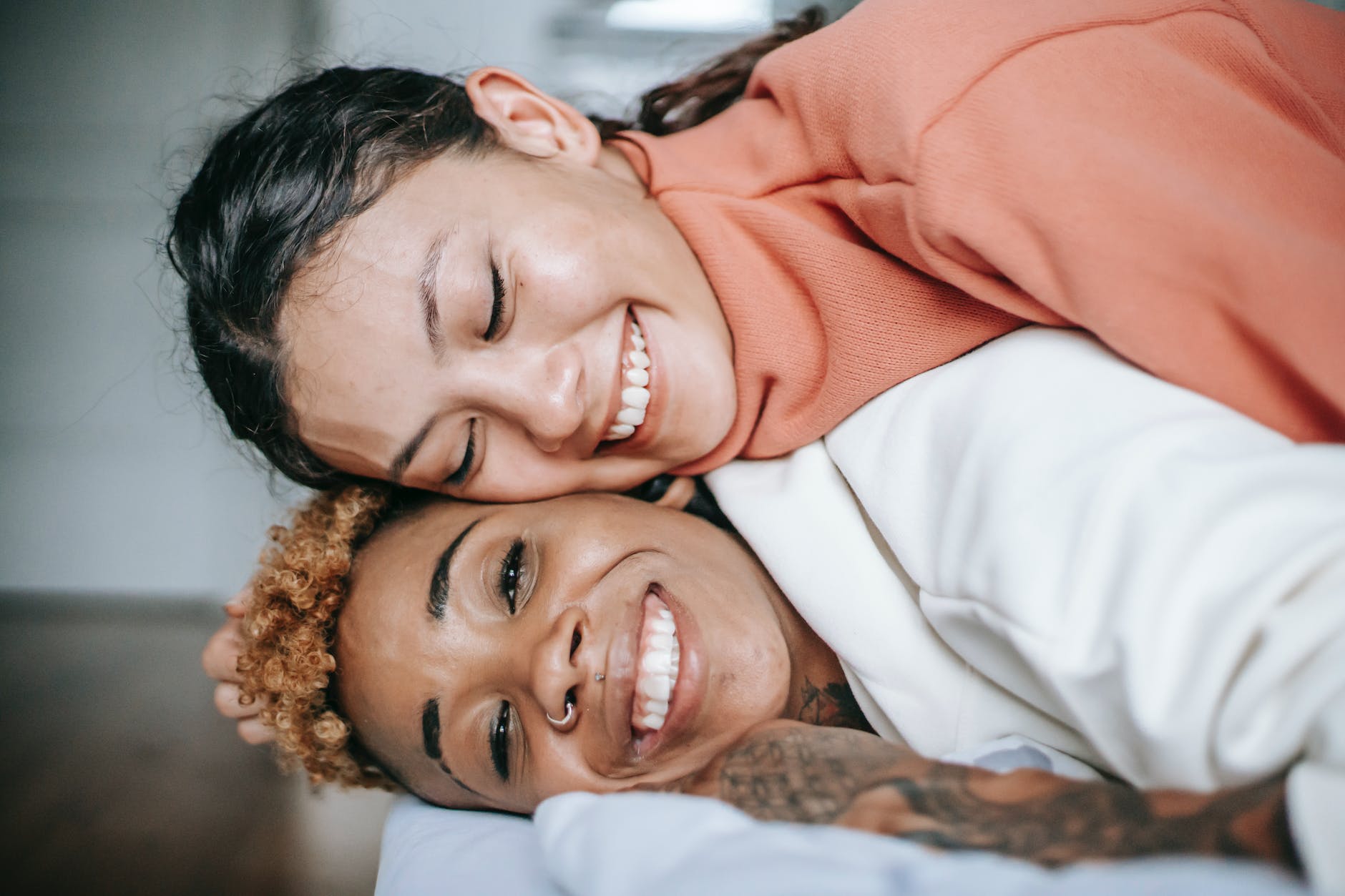 women smiling at the camera