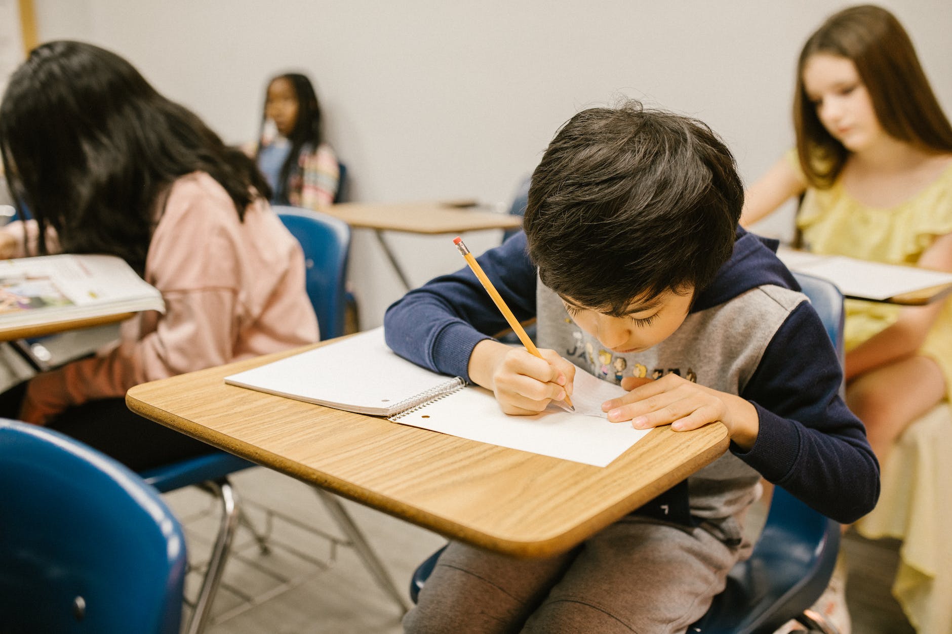 boy studying and doing his homework