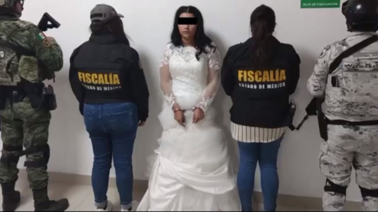Police arrest bride in her wedding gown