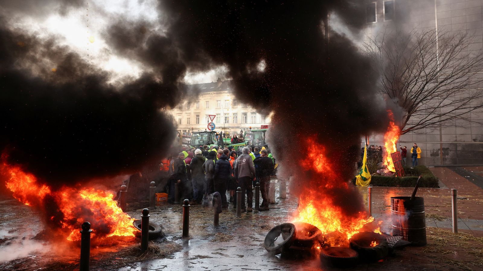 Why are famers protesting outside European Parliament in Brussels?
