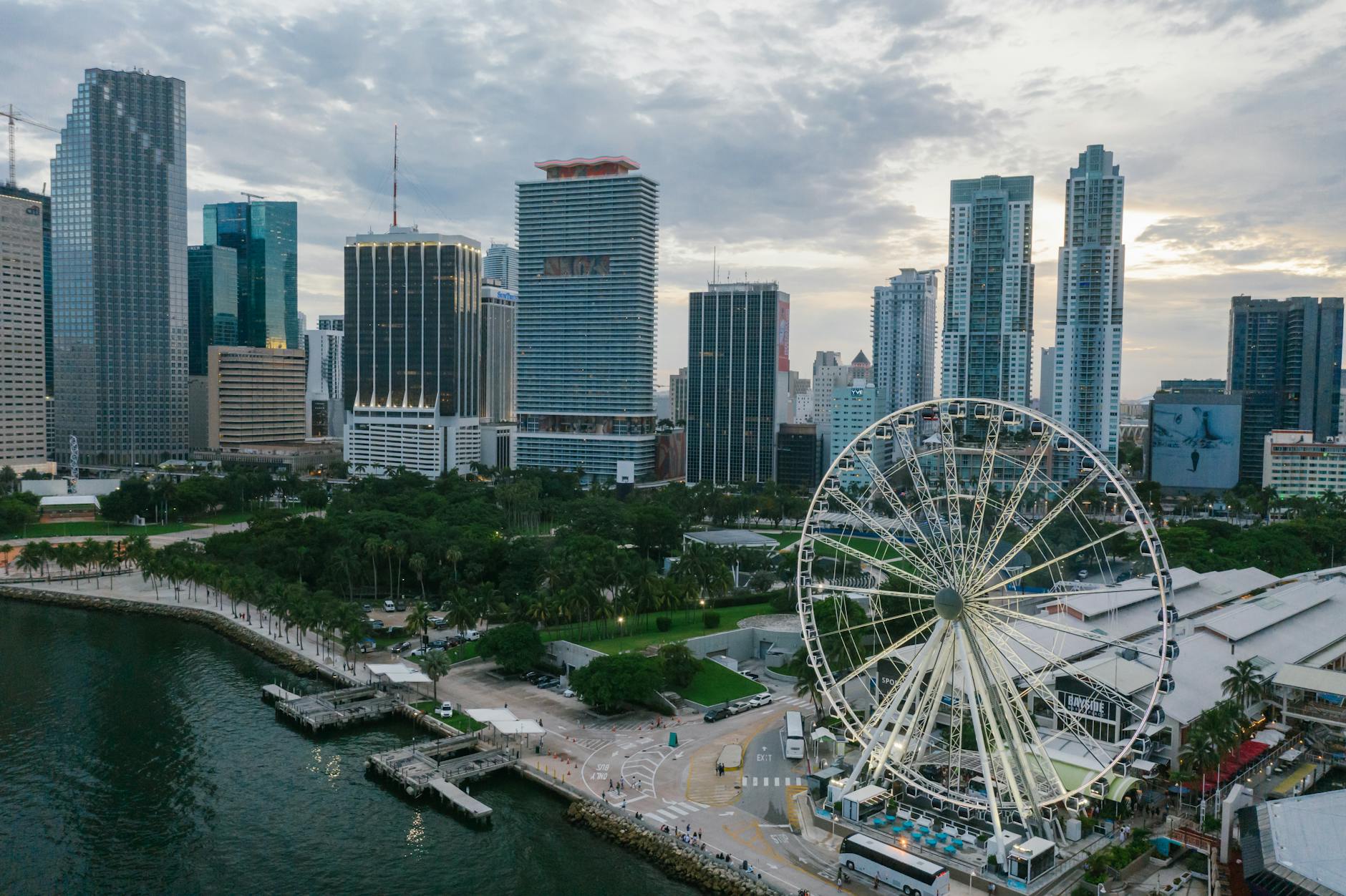 aerial photography of high rise buildings and ferris wheel in miami florida
