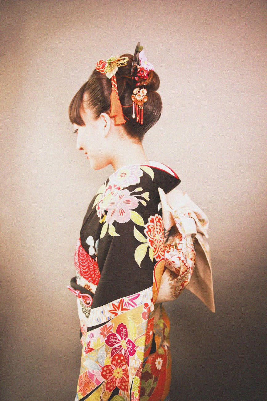 woman in black yellow and red floral kimuno dress