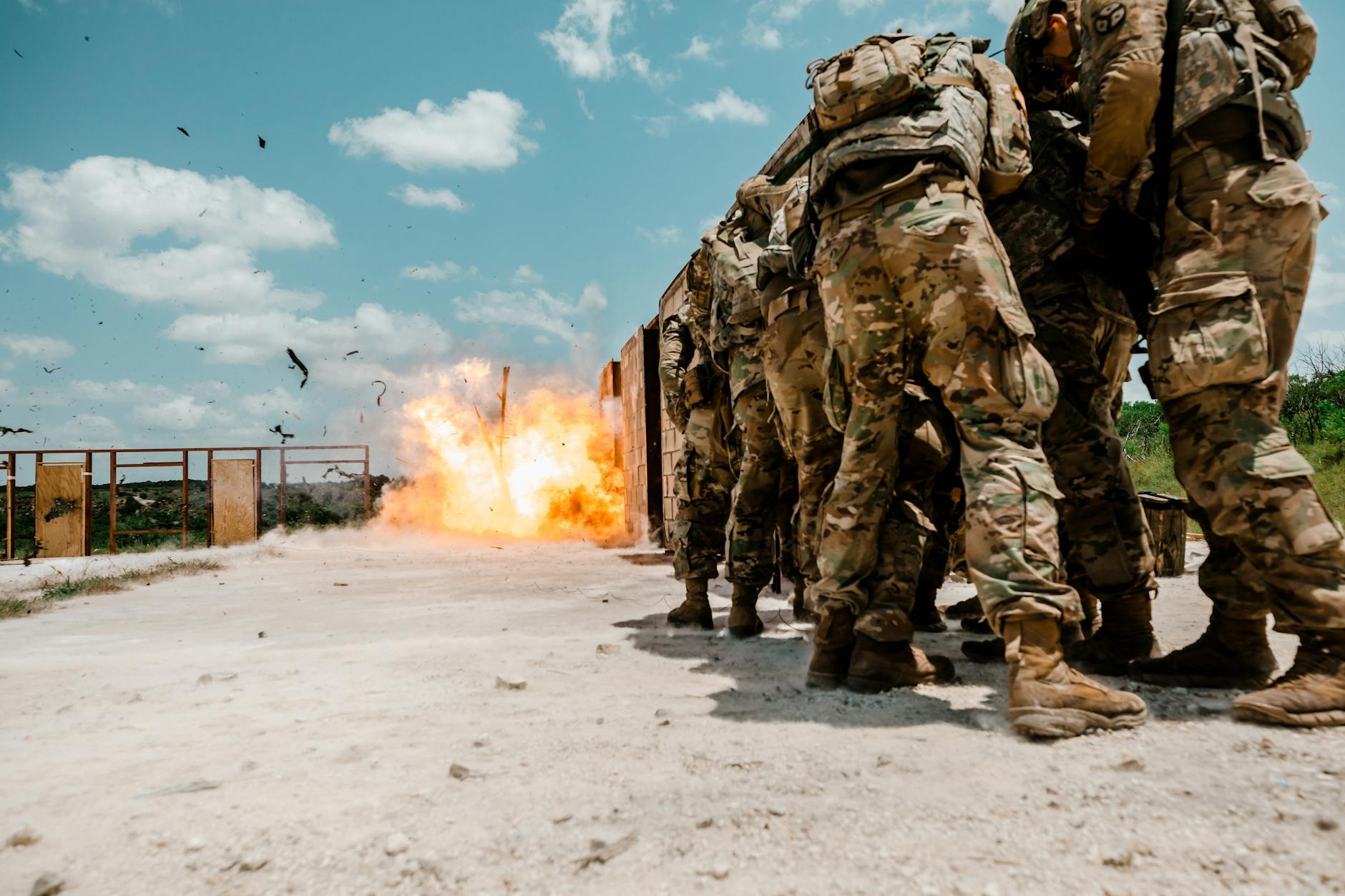 soldiers watching explosion