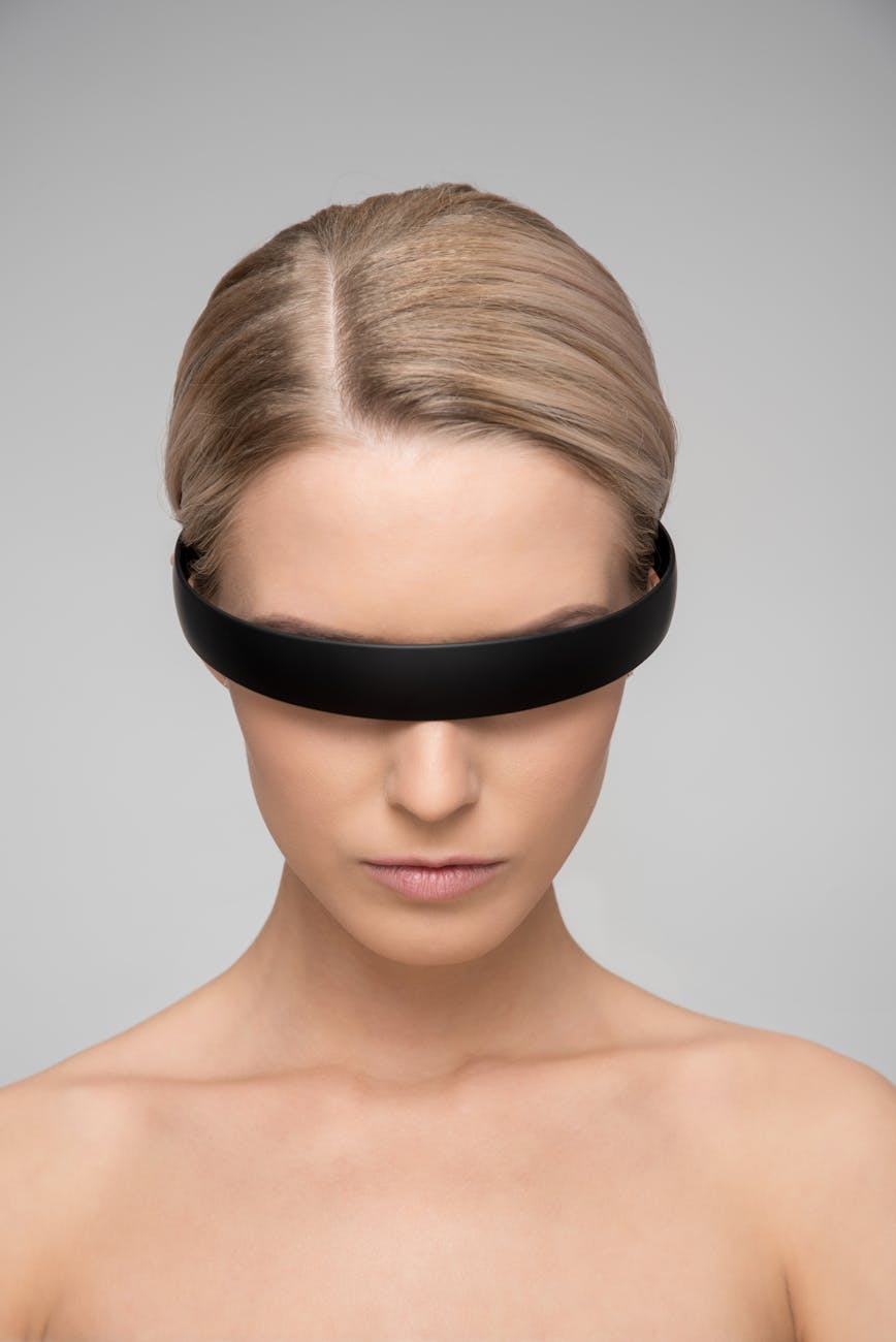 topless woman wearing black headband