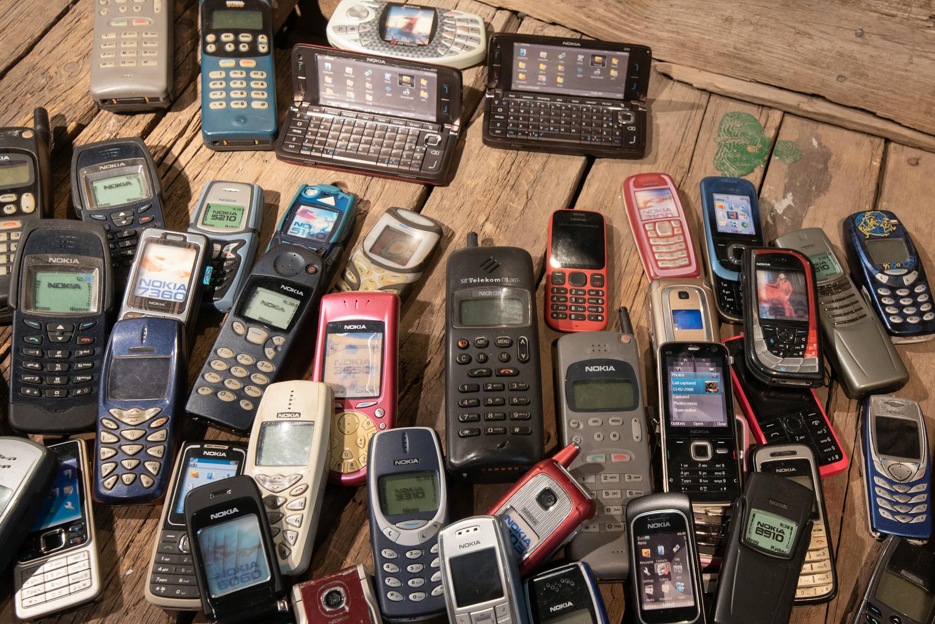 stack of obsolete phones