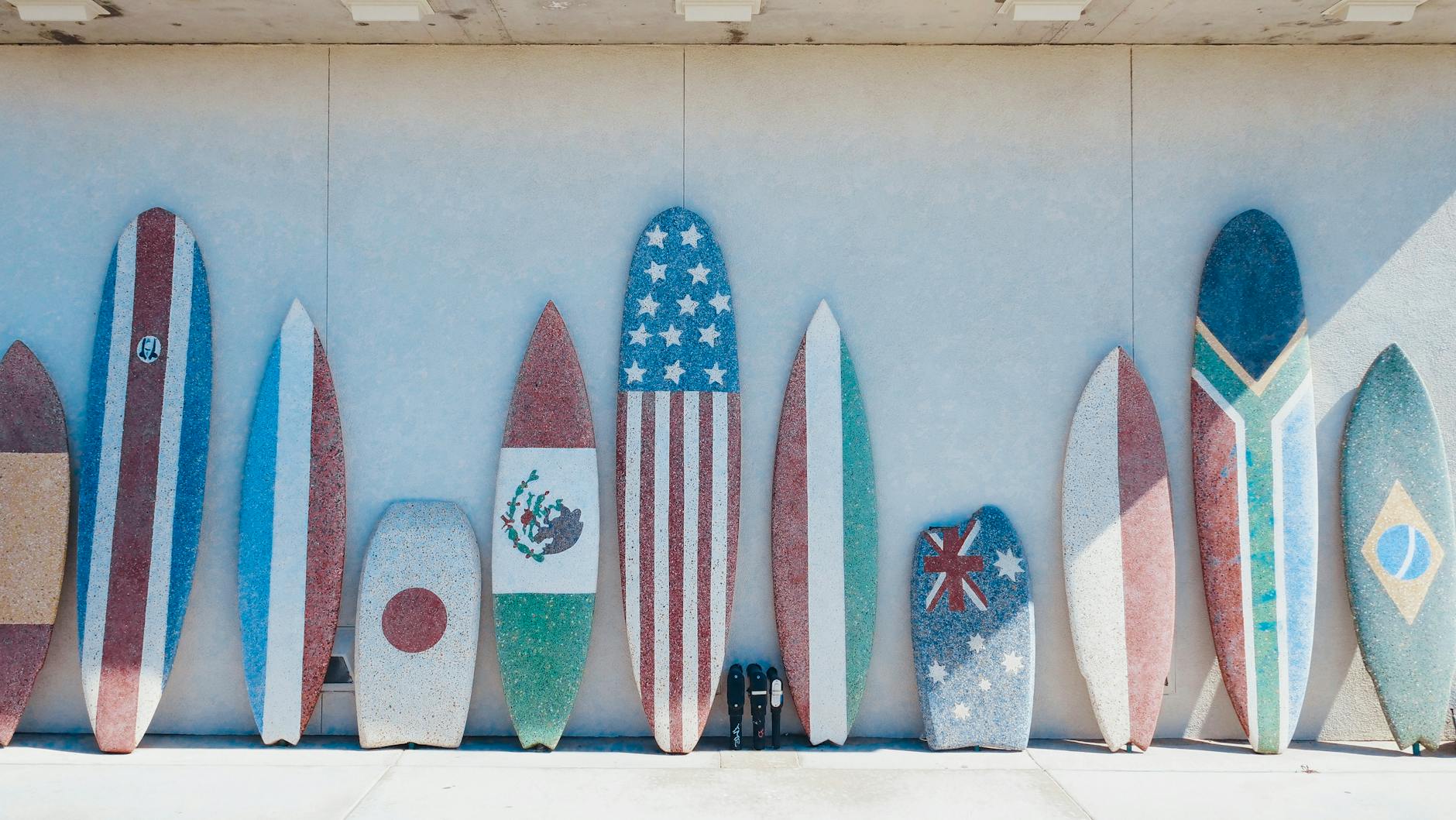 surfboards leaning on the wall