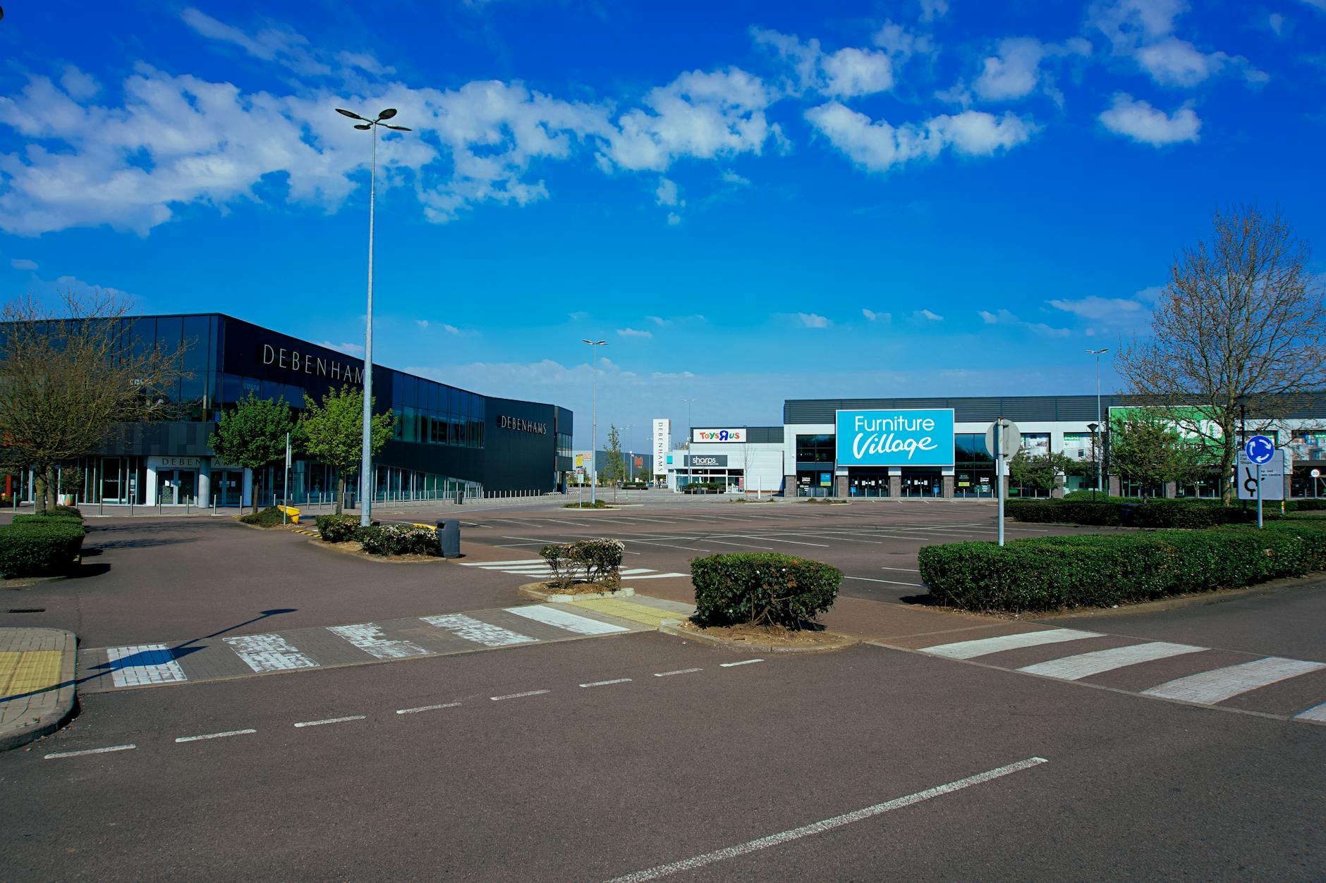 view of parking space before large shopping centres