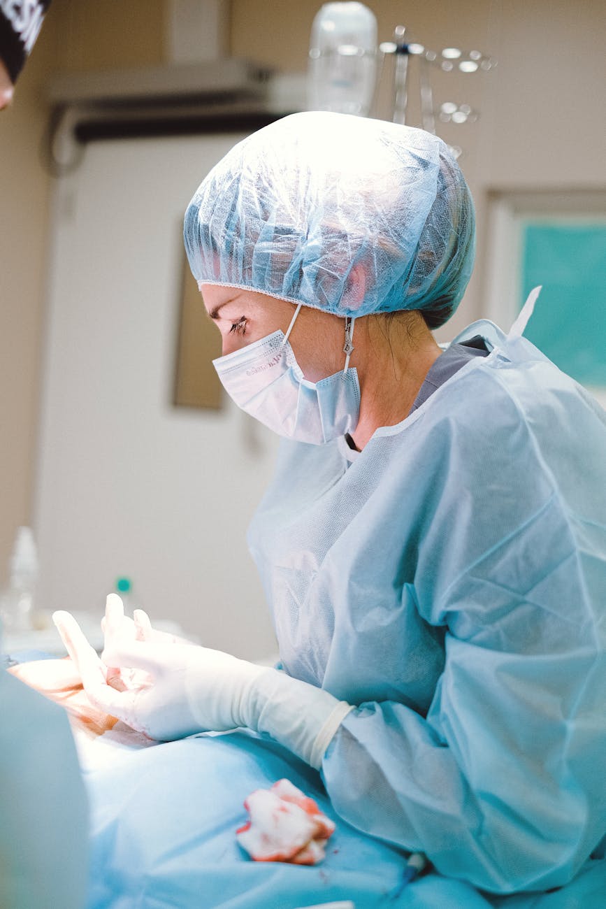 female doctor in blue scrub suit