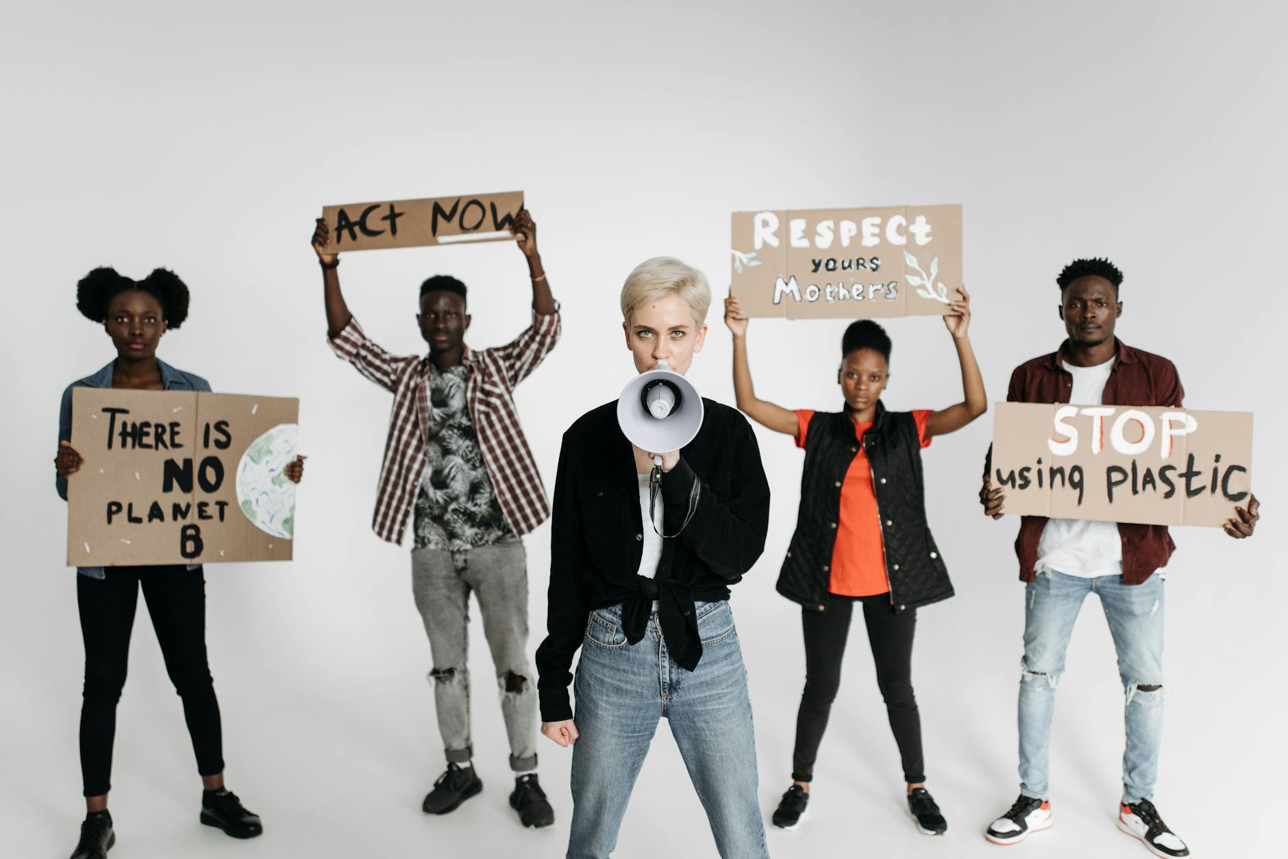 people with banners supporting ecology