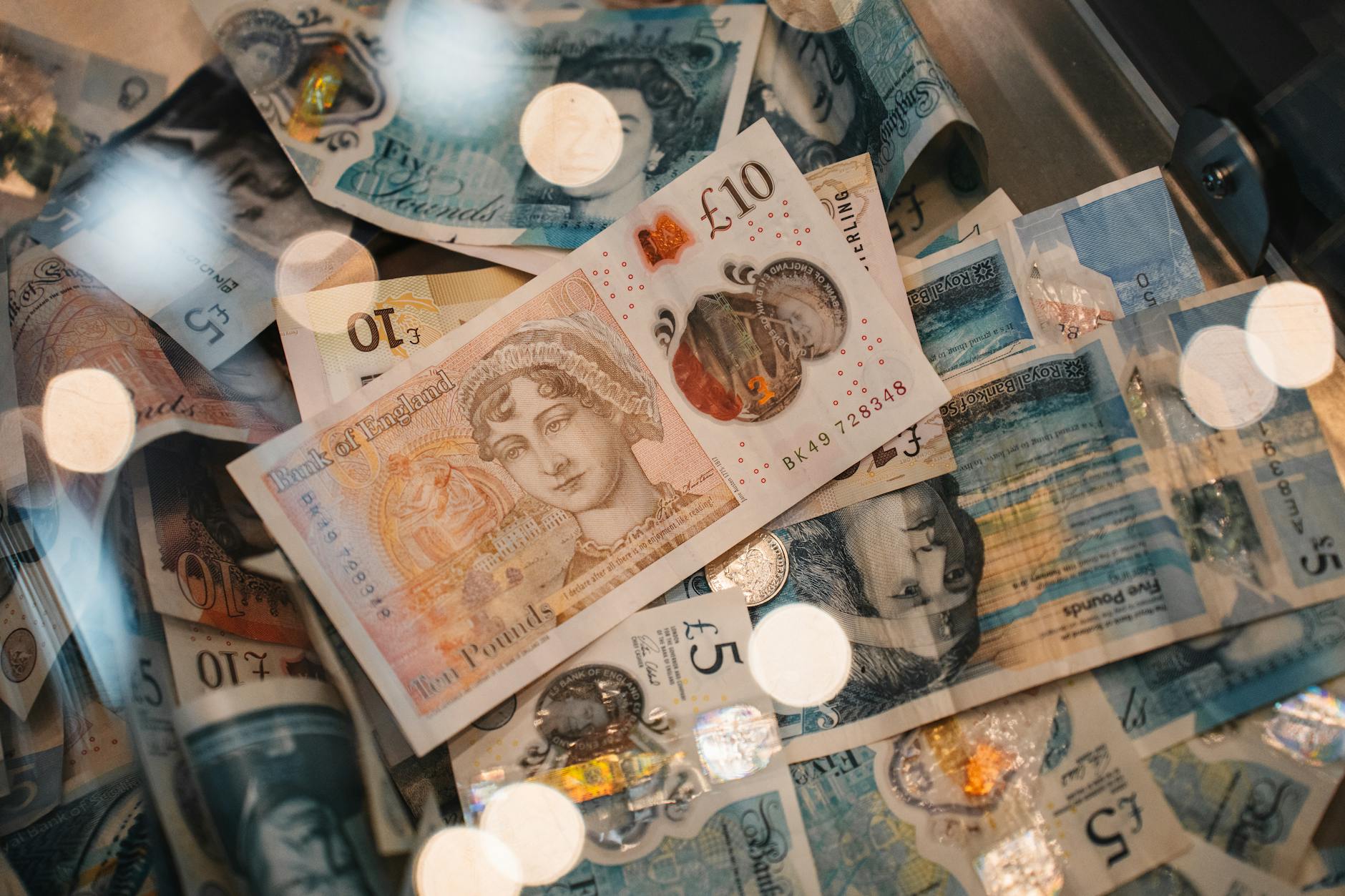close up of british pound sterling currency notes