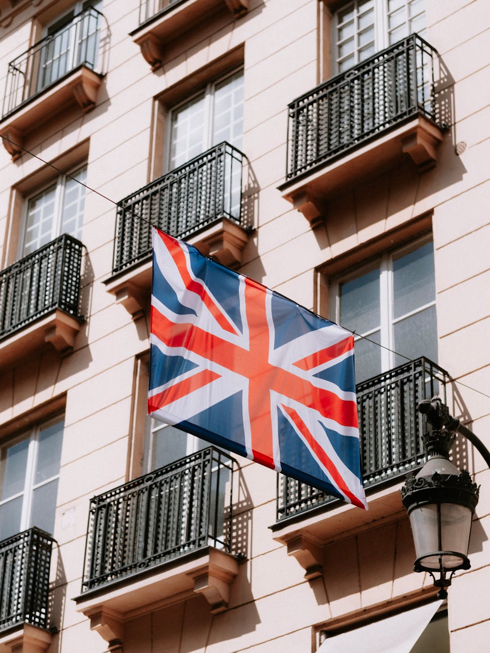 british flag near balconies