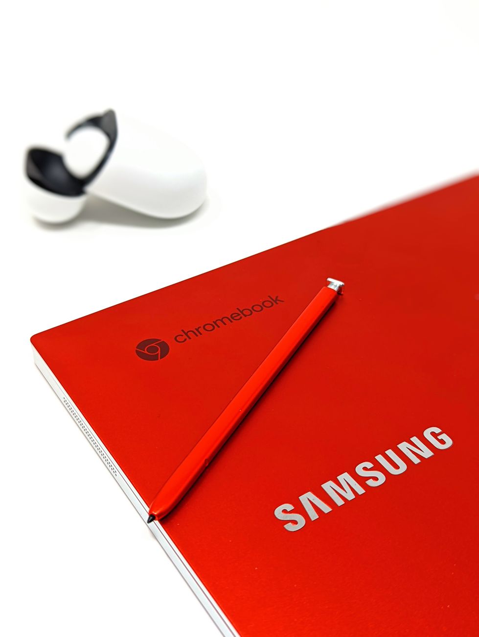 closeup of a red booklet against white background