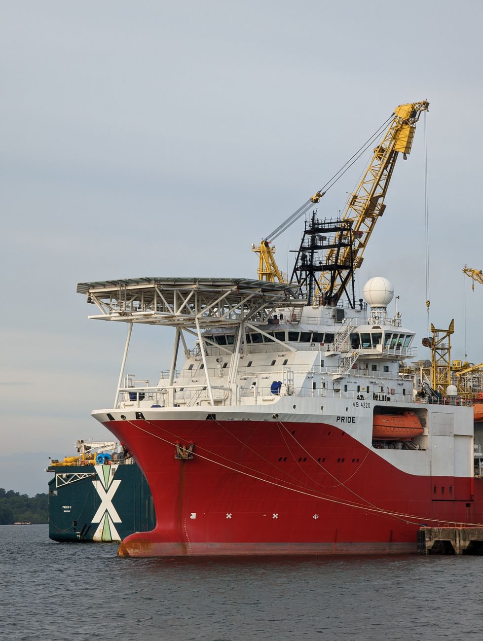 red and white ship on water