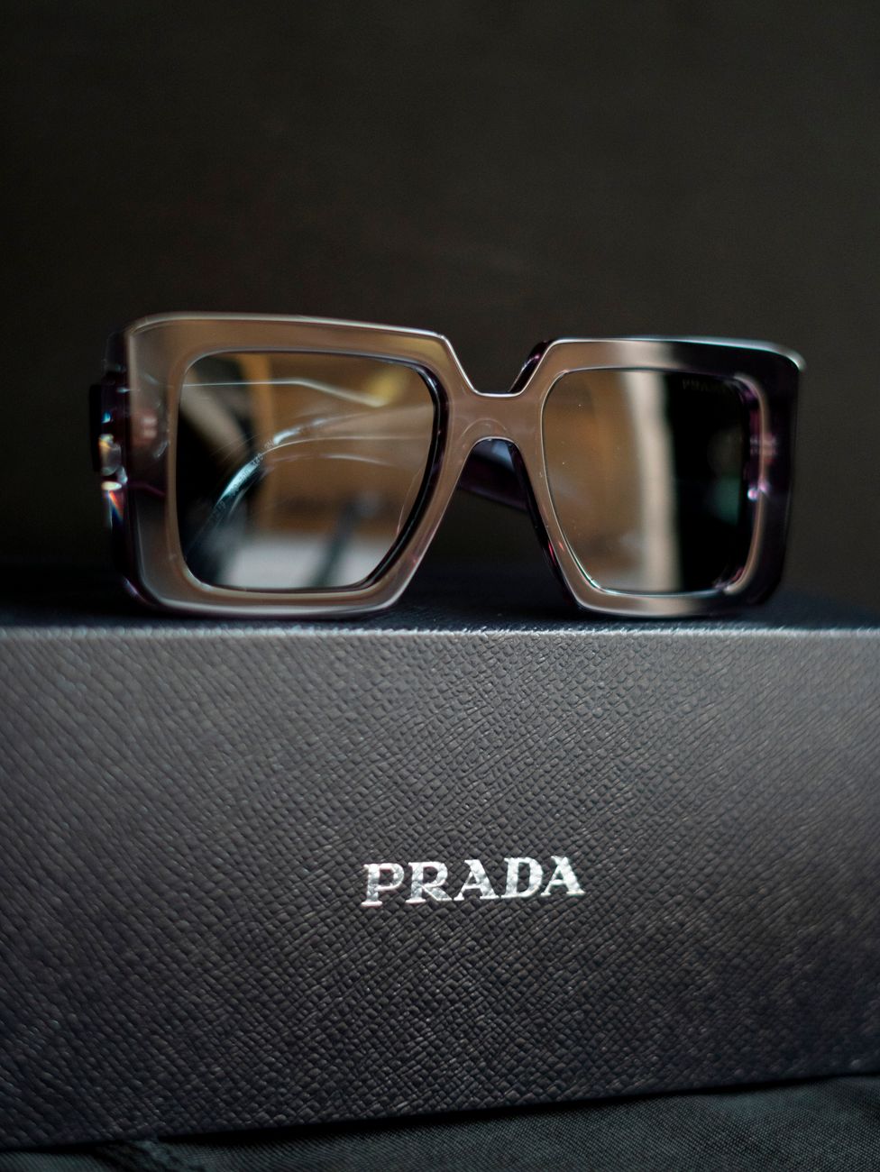stylish prada sunglasses on display