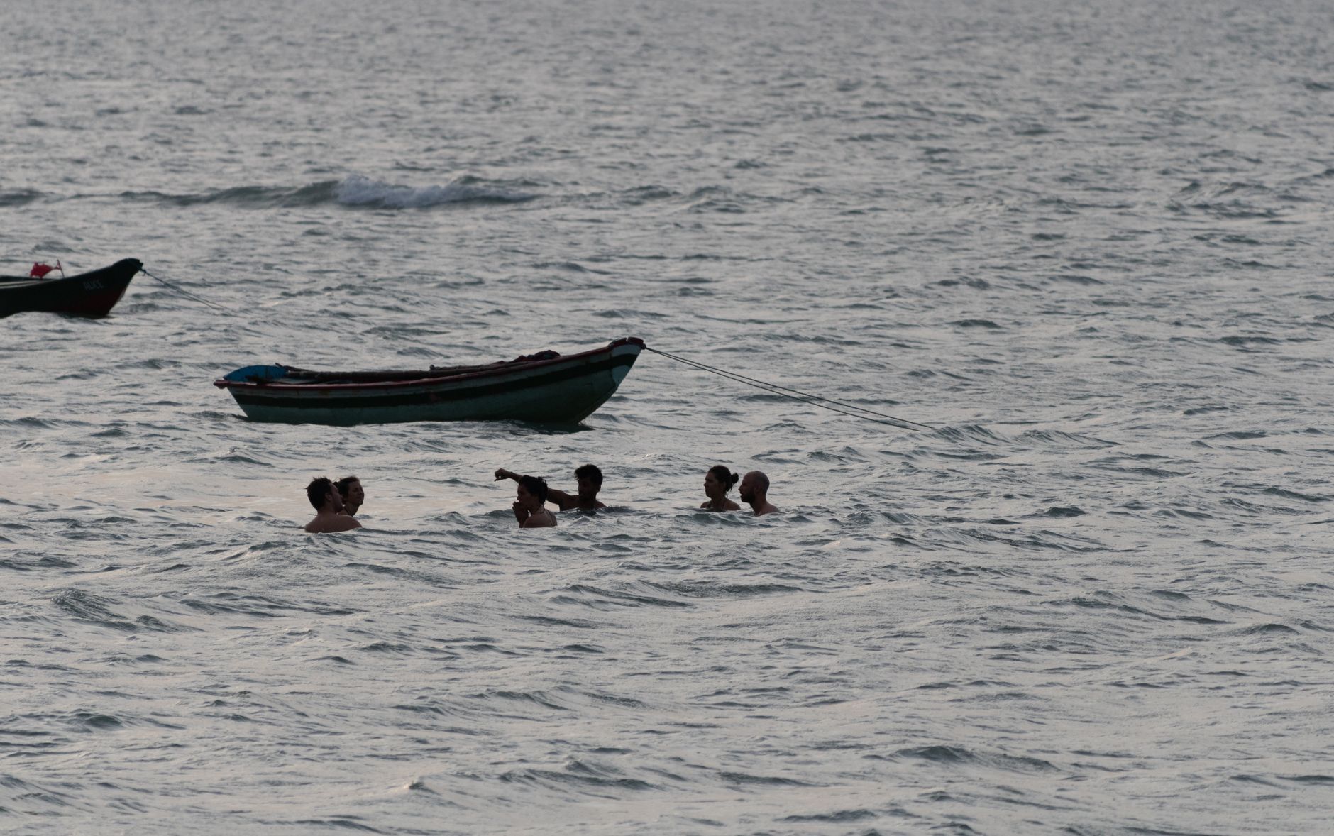 people bathing in the sea