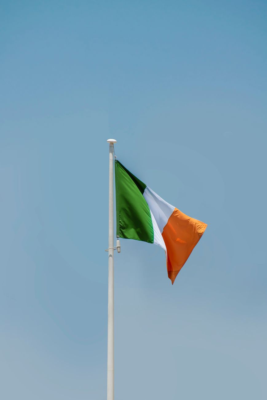 ireland national flag under blue sky