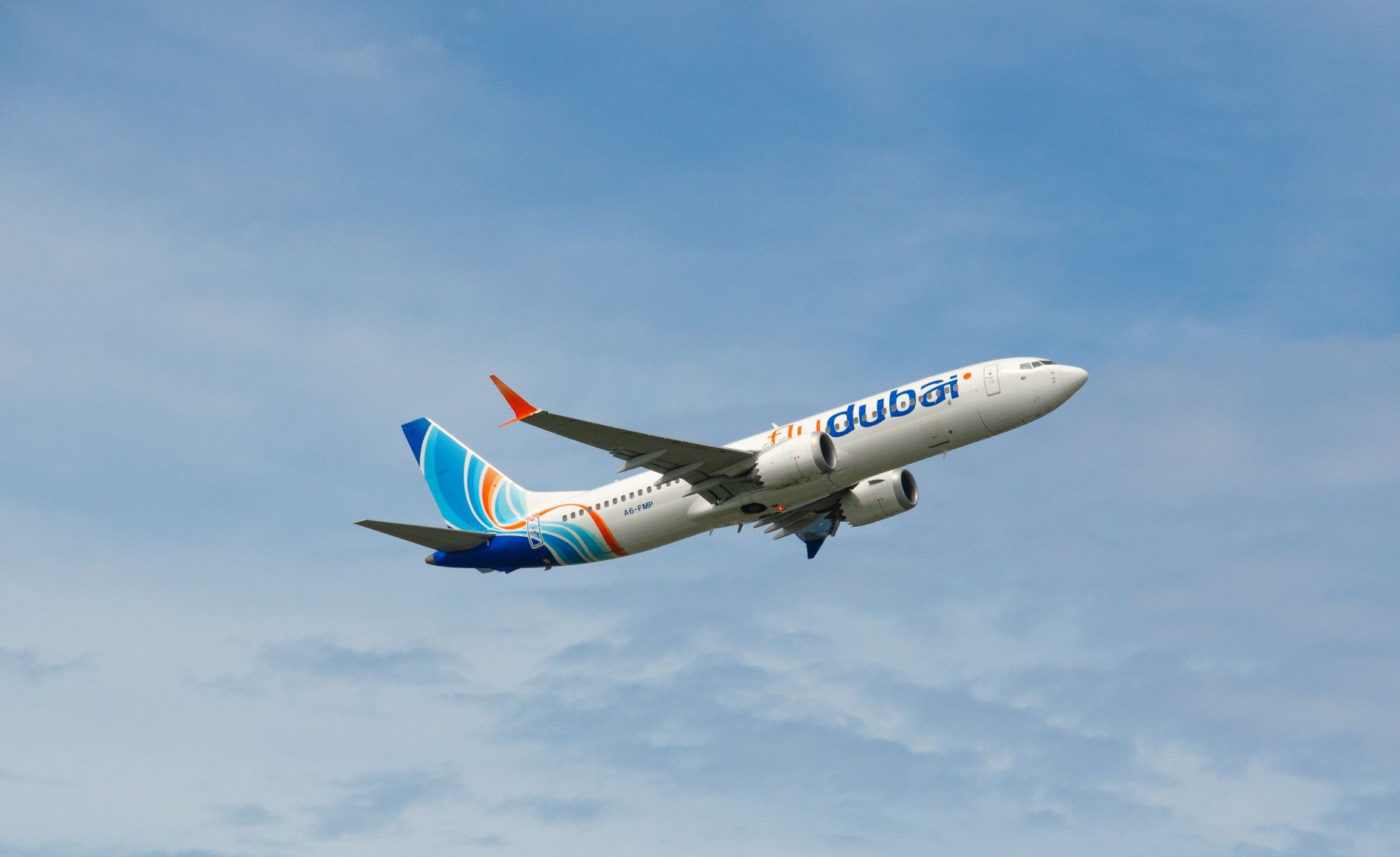 flydubai aircraft taking off in clear skies