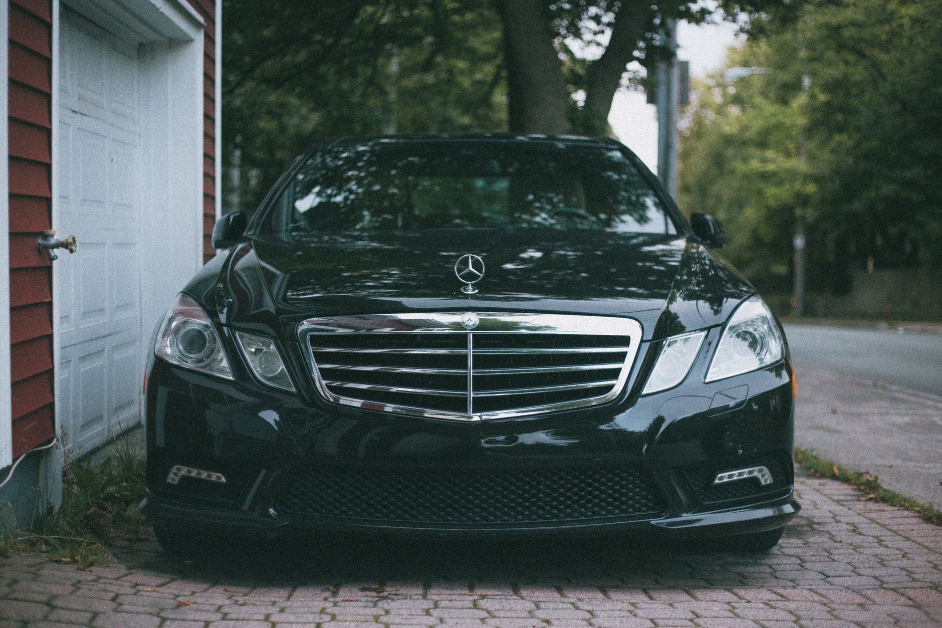 photograph of a black mercedes benz car